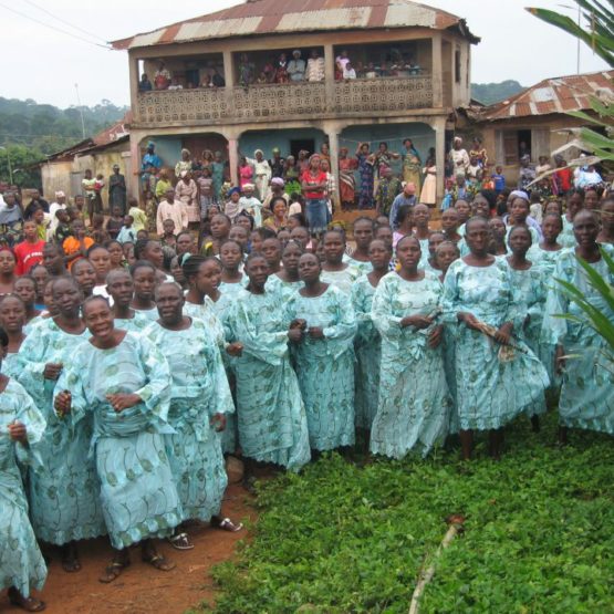 The Oloris and spectators during coronation ceremony in December 2009